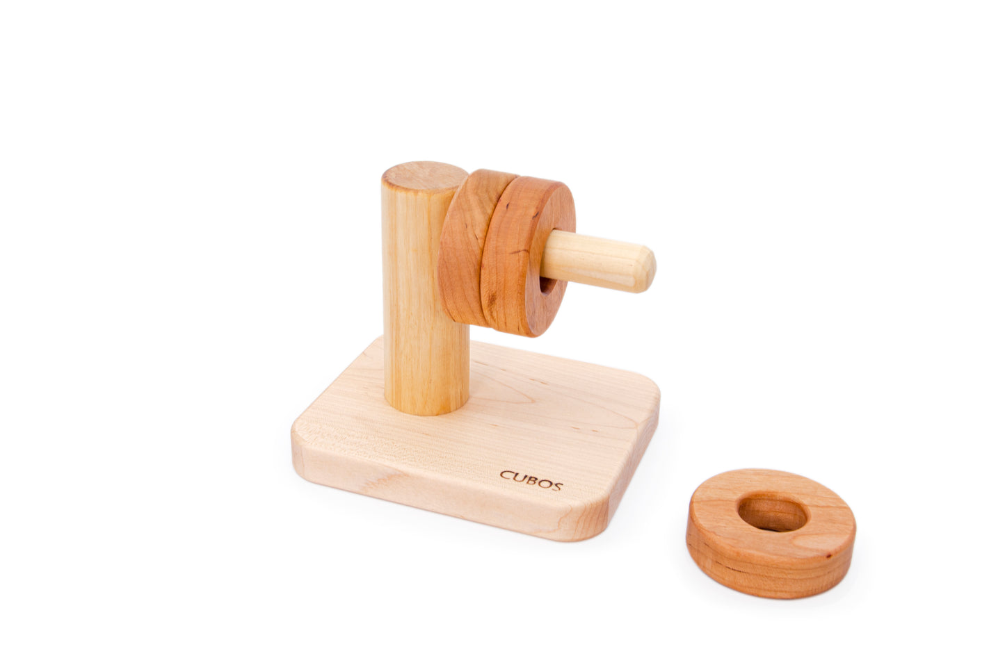 Montessori Horizontal Dowel Rings Stacker - A wooden toy featuring a horizontal dowel with rings of the same size stacked on it, made of hardwood Cherry for durability. 100% natural and finished only with Beeswax, ensuring safety and a natural touch in Montessori education.