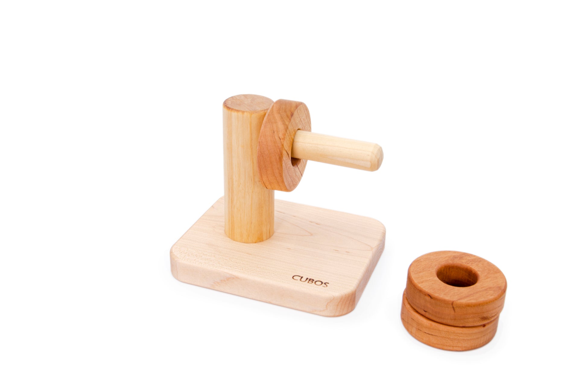 Montessori Horizontal Dowel Rings Stacker - A wooden toy featuring a horizontal dowel with rings of the same size stacked on it, made of hardwood Cherry for durability. 100% natural and finished only with Beeswax, ensuring safety and a natural touch in Montessori education.