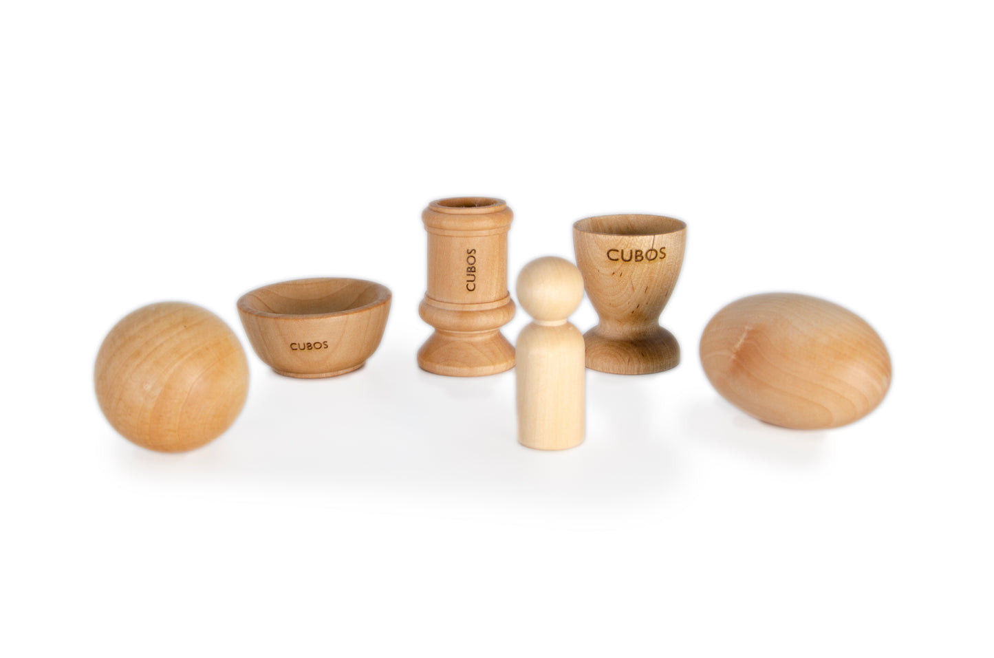 Open Ball, Bowl, Peg, and Egg Cup - A set of wooden sensory toys including a ball, a bowl, a peg, and an egg cup, offering tactile exploration and fine motor skill development in Montessori education
