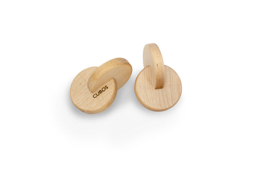 Montessori Handmade Wooden Interlock Disc - A set of handmade wooden interlocking discs, perfect for children aged 4 months and above. Promotes hand to hand transferring skills, fine motor skills, and hand-eye coordination in Montessori education. Crafted from high-quality hardwood for durability and a natural feel.